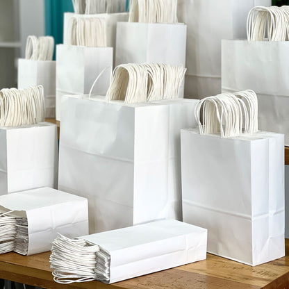 اكياس كرتون بعدة احجام ( ابيض - بني ) Paper Bags ( White & Brown )